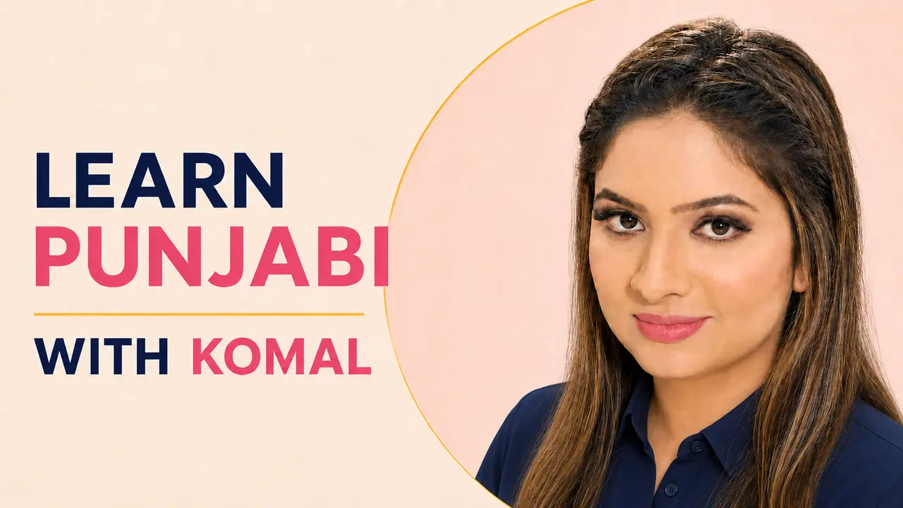 Komal, professional Punjabi tutor, wearing a navy collared shirt
